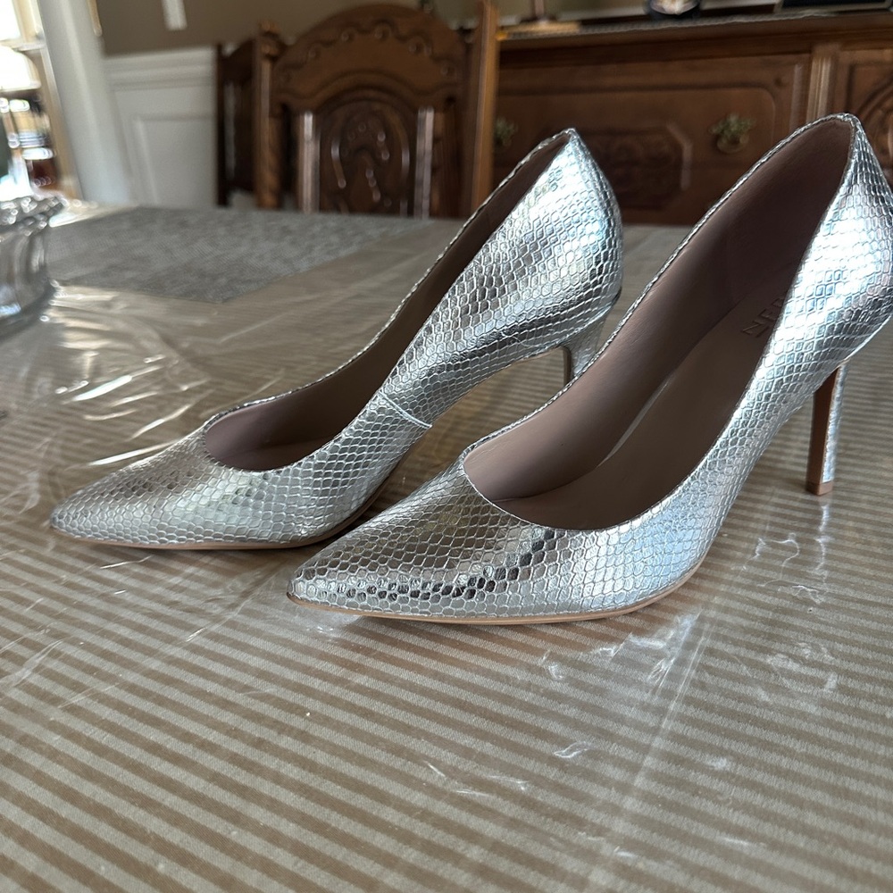 Silver dressy pumps by Naturalizer. “Anna”